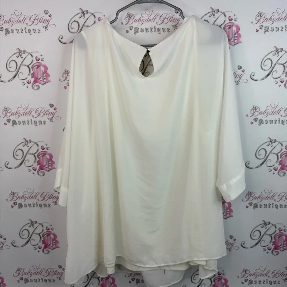 Laura top blouse flower design Elegant Floral Blouse with Artistic Design